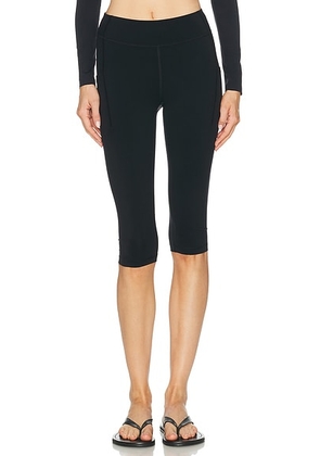 Literary Sport Lena Capri Tight in Black - Black. Size L (also in M, S, XL, XS).