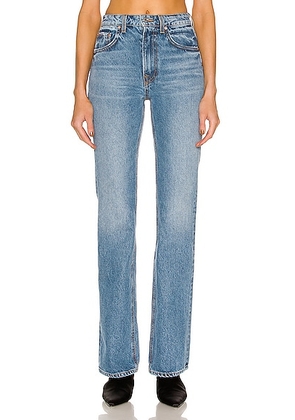 GRLFRND Melanie High Rise Boot Cut in Lincoln Square - Denim-Medium. Size 28 (also in ).