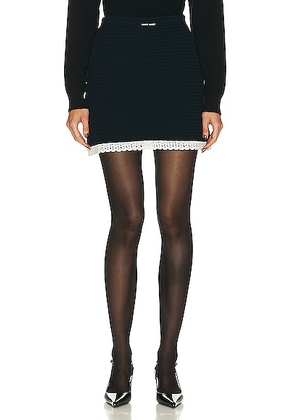 Miu Miu Textured Cotton Skirt in Blu - Navy. Size 40 (also in ).