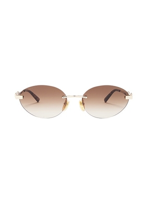 Gucci Through Horsebit Oval Sunglasses in Gold & Brown - Brown. Size all.