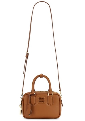 Miu Miu Arcadie Softy Padded Bag in Cognac - Brown. Size all.