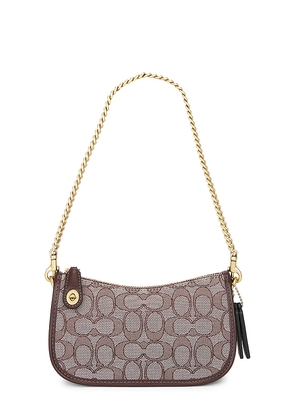 Coach Originals Swinger 20 Bag in Brown.