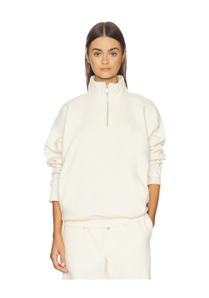On Club Collective 1/4 Zip Sweater in Cream. Size L. Also in XL.