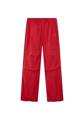 CHOCOOLATE logo-print trousers - Red