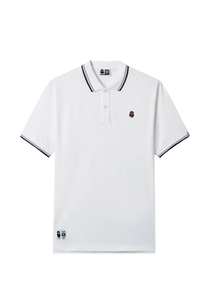 FINGERCROXX logo-appliqué polo shirt - White