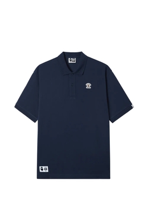 FINGERCROXX logo-appliqué polo shirt - Blue