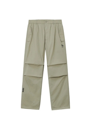 izzue logo-detail trousers - Neutrals