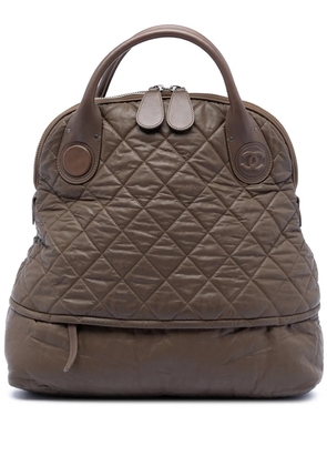 CHANEL Pre-Owned 2011 Quilted Coated Canvas Expandable Zip travel bag - Brown