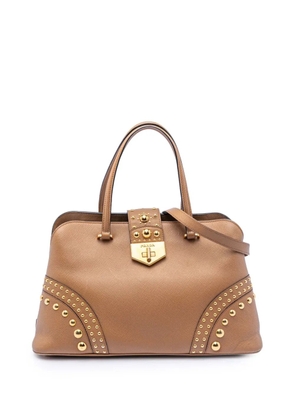 Prada Pre-Owned 2010-2026 Studded Saffiano Cuir Promenade satchel - Brown