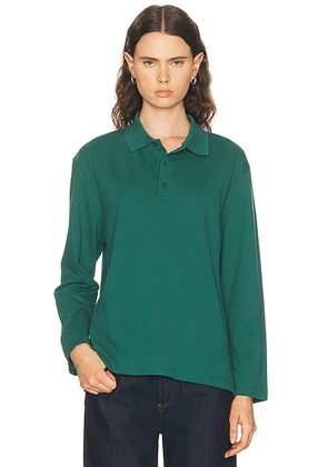 FLORE FLORE Diana Polo Top in Evergreen - Green. Size L (also in M, S, XS).