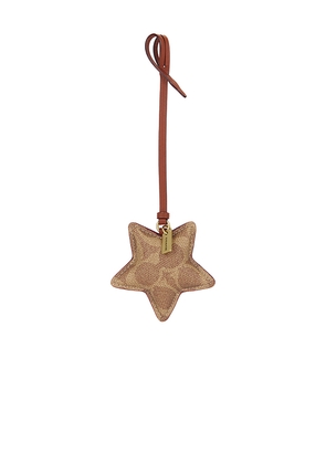 Coach Star Puffy Signature Bag Charm in Brown.