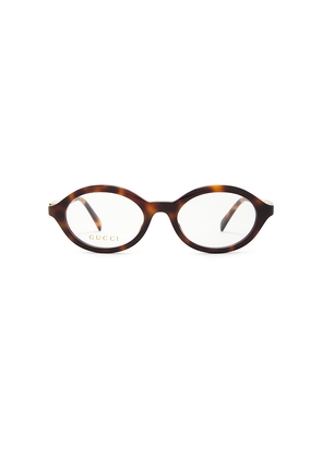 Gucci Oval Eyeglasses in Brown.