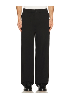 FRAME Relaxed Cotton Trousers in Black. Size L. Also in M, S, XL/1X.
