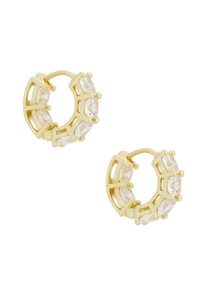 SHASHI Cushion Cut Diamond Huggie Earrings in Metallic Gold.