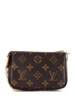 Louis Vuitton Pre-Owned Pochette Accessoires Monogram Canvas Mini clutch bag - Brown