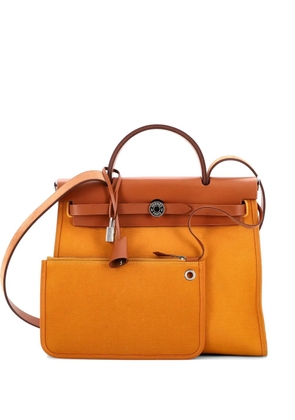 Hermès Pre-Owned Herbag Zip Leather and Toile 31 shoulder bag - Orange
