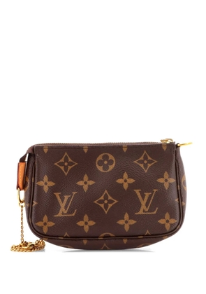 Louis Vuitton Pre-Owned Pochette Accessoires Monogram Canvas Mini clutch bag - Brown
