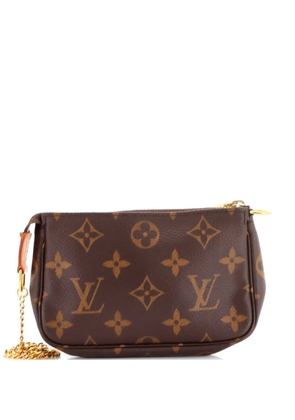 Louis Vuitton Pre-Owned Pochette Accessoires Monogram Canvas Mini clutch bag - Brown