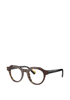 Luxottica Eyewear round frame glasses - Brown