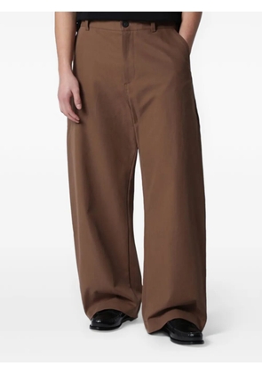 Studio Nicholson Bosworth wide-leg trousers - Brown