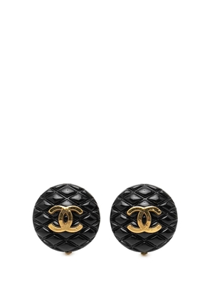 CHANEL Pre-Owned 1994 CC Gold Plated Resin Quilted Button Clip On Earrings costume earrings - Black