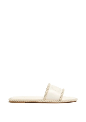 Valentino Garavani Vlogo Torchon slide sandals in nappa leather - Neutrals