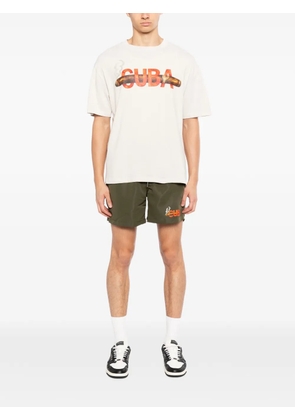 Melt graphic-print swimming shorts - Green