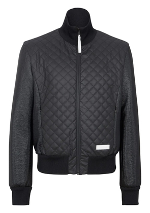 Balmain logo-patch quilted bomber jacket - Black