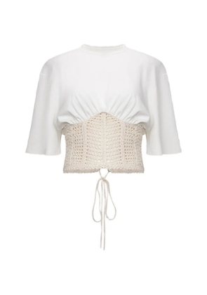 The Mannei crochet lace-up top - White