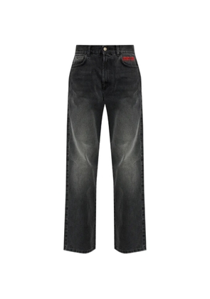 CARNE BOLLENTE star-embellished jeans - Black