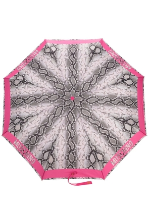 Moschino logo-edge snakeskin-print umbrella - Pink