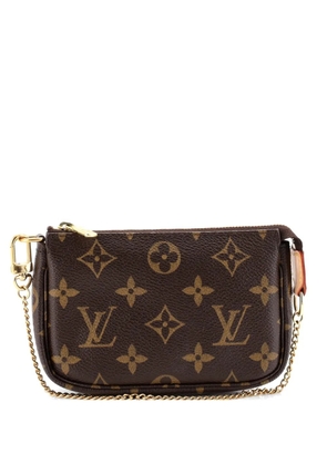 Louis Vuitton Pre-Owned Pochette Accessoires Monogram Canvas Mini clutch bag - Brown