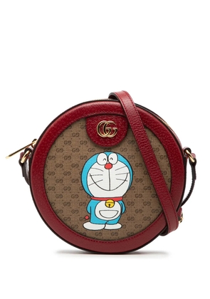 Gucci Pre-Owned 2016-2025 Micro GG Supreme Doraemon Round crossbody bag - Brown