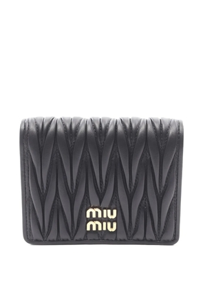 Miu Miu Pre-Owned matelassé-effect wallet - Black