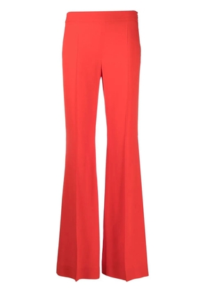 Moschino pressed-crease flared trousers