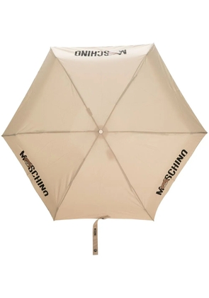 Moschino logo-print compact umbrella - Neutrals