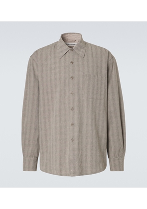 Our Legacy Above striped cotton and linen-blend shirt