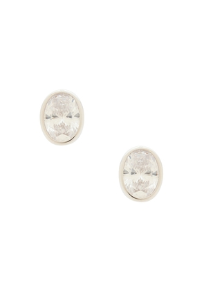 SHASHI Oval Bezel Stud in Metallic Silver.