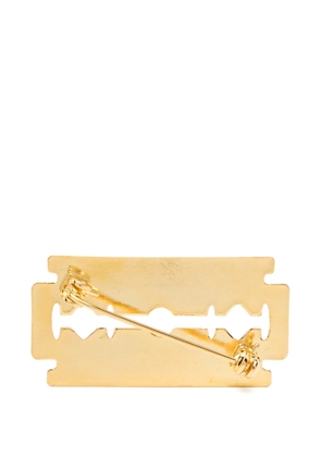 Undercover logo-debossed brooch - Gold