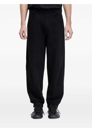 Osklen patch-pocket trousers - Black