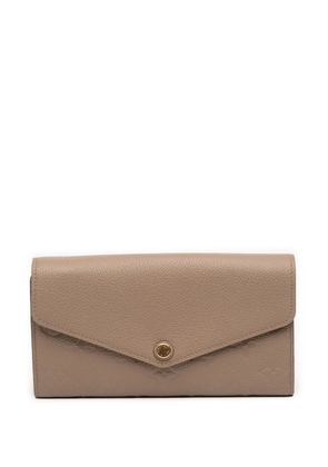 Louis Vuitton Pre-Owned 2021-2025 Monogram Empreinte Sarah Wallet long wallets - Brown