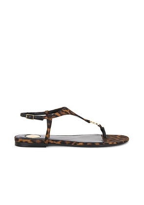 Saint Laurent Cassandra Flat Sandal in Leopard & Manto Naturale - Brown. Size 37 (also in 35.5, 37.5, 38, 38.5, 39, 39.5, 40).