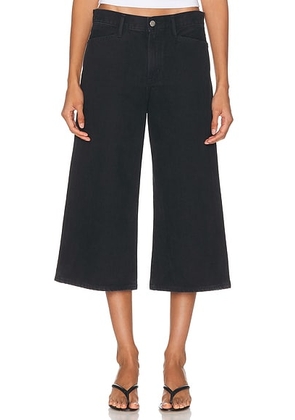 AGOLDE X Maria McManus Skater Short in Washed Black - Black. Size 24 (also in 25, 28, 29, 30).