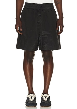 Fear of God Padded Sport Short in Off Black - Black. Size L (also in M, XL/1X).