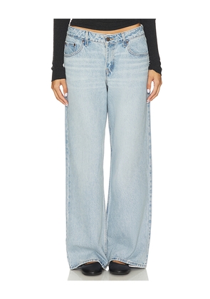 LEVI'S Low Loose Jeans in Blue. Size 31. Also in 24.