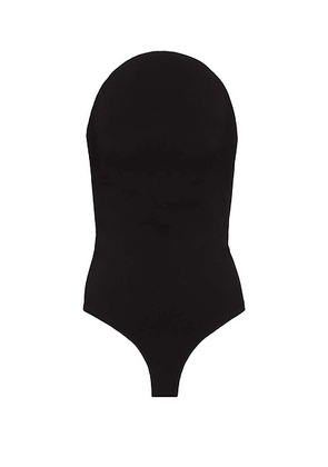 ALAÏA Curved Bodysuit in Noir Alaia - Black. Size 36 (also in ).