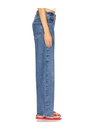 AGOLDE Low Curve Jeans in Denim-Medium. Size 24. Also in 23, 25, 26, 27, 28, 29, 34.