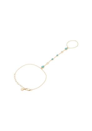 Ettika Dripping Crystal Hand Chain in Metallic Gold.