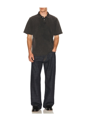Corridor Pique Polo in Black. Size L. Also in S, M.