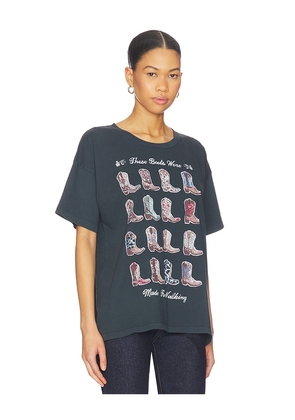 DAYDREAMER Boots For Walking Merch Tee in Black. Size M. Also in S, XL, XS.